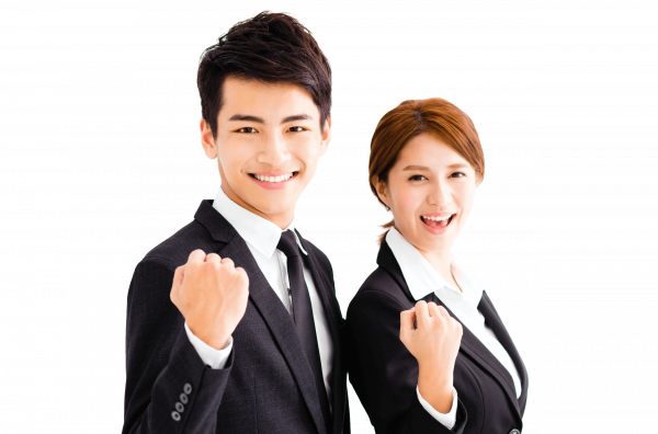 Business man and woman fist pumping with motivation